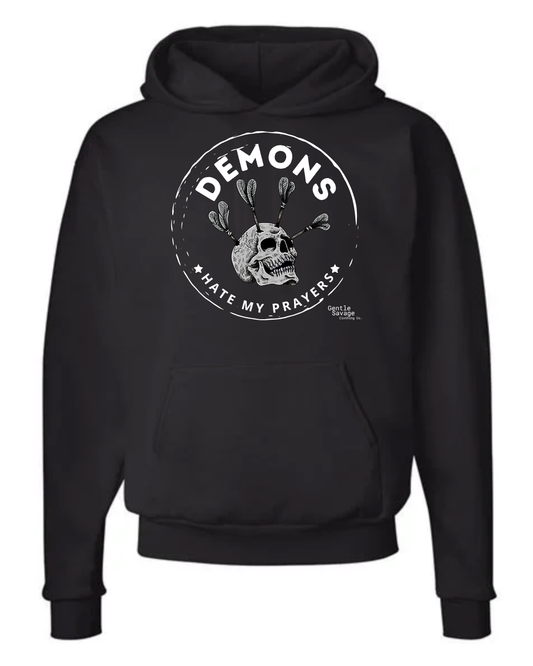 Black hoodie with a graphic design on a white background